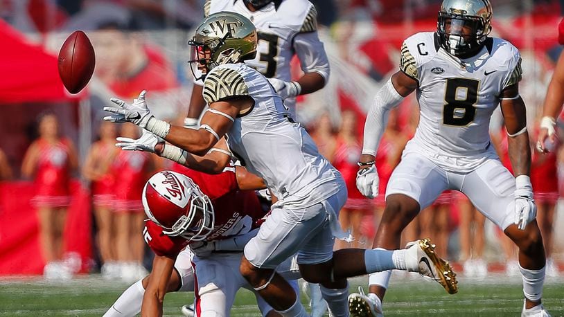 BLOOMINGTON, IN - SEPTEMBER 24: Jessie Bates #3 of the Wake Forest Demon Deacons reaches for and makes the interception against the Indiana Hoosiers at Memorial Stadium on September 24, 2016 in Bloomington, Indiana. (Photo by Michael Hickey/Getty Images)