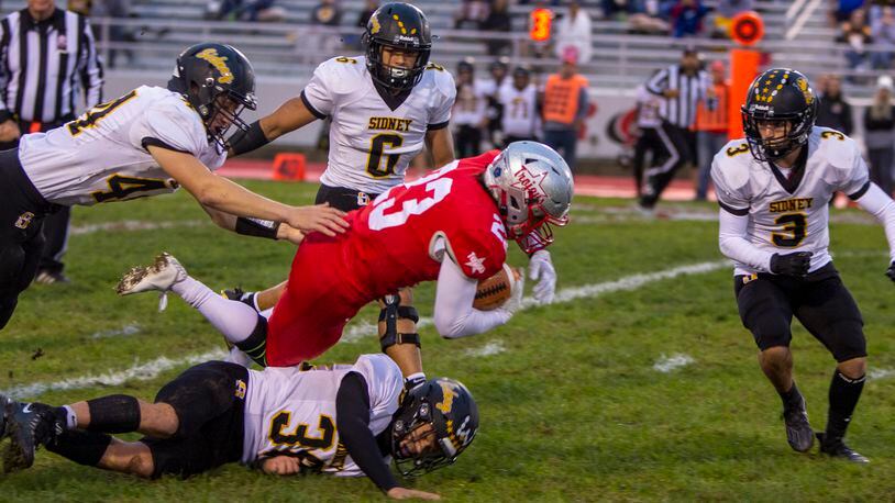 Troy running back Nick Kawecki dives for extra yardage against Sidney during the first half on Thursday, Sept. 23, 2021, in Troy. Photo by Jeff Gilbert
