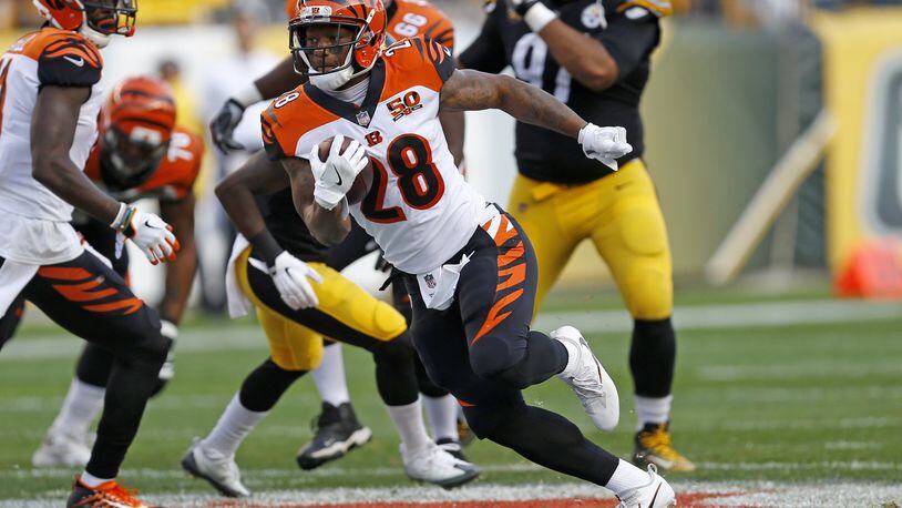 Cincinnati Bengals running back Joe Mixon (28) carries the ball during the first half of an NFL football game against the Pittsburgh Steelers in Pittsburgh, Sunday, Oct. 22, 2017. The Steelers won 29-14. (AP Photo/Keith Srakocic)