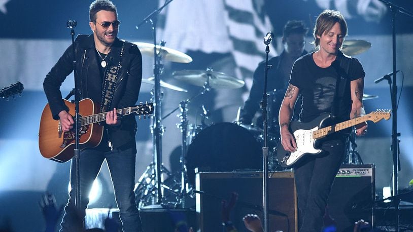 ARLINGTON, TX - APRIL 19:  Singer-songwriters Eric Church (L) and Keith Urban perform onstage during the 50th Academy of Country Music Awards at AT&T Stadium on April 19, 2015 in Arlington, Texas.  (Photo by Cooper Neill/Getty Images for dcp)