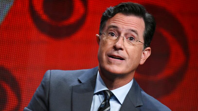 FILE - In this Aug. 10, 2015, file photo, Stephen Colbert participates in "The Late Show with Stephen Colbert" segment of the CBS Summer TCA Tour in Beverly Hills, Calif. Colbert says he has no regrets about insulting President Donald Trump in a monologue that included a crude sexual reference and prompted calls to fire him and boycott âLate Showâ advertisers. In his Wednesday, May 3, 2017, monologue, Colbert says he would change âa few words that were cruder than they needed to beâ but heâd still do it again.  (Photo by Richard Shotwell/Invision/AP, File)