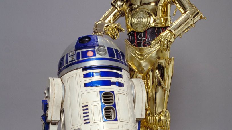Though droids in the “Star Wars” films, C-3PO and R2-D2 were actually costumes worn by actors. Guests to the Cincinnati exhibition can see the foot straps for the actor inside. Submitted photo. Requiredimagecredit:©&™2015LucasfilmLtd.Allrightsreserved.Usedunderauthorization.