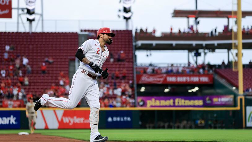 Cincinnati Reds' Nick Castellanos runs the bases after hitting a solo home run during the first inning of a baseball game against the San Diego Padres in Cincinnati, Wednesday, June 30, 2021. (AP Photo/Aaron Doster)