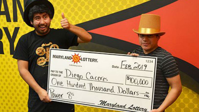 Diego Caceres, left, and his brother Domingo. Diego bought a lotto ticket after remembering advice from a fortune cookie. (Photo: Maryland Lottery)