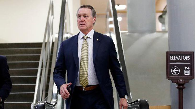 A Georgia Tech political group says Sen. David Perdue, R-Ga., snatched a phone from a student who was video recording while asking the Republican lawmaker a question about Georgia's governor's race.