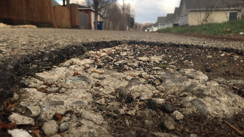 Two roadways in Old Dayton View are targeted for resurfacing this year. This is Berm Street, which will be repaved from Easton Street to Newport Avenue. CORNELIUS FROLIK / STAFF