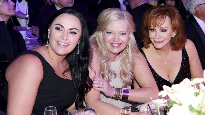 Calamity McEntire, actress Melissa Peterman and host Reba McEntire attend Muhammad Ali’s Celebrity Fight Night XXIII at the JW Marriott Desert Ridge Resort & Spa on March 18, 2017 in Phoenix, Arizona. (Photo by Jonathan Leibson/Getty Images for Celebrity Fight Night)