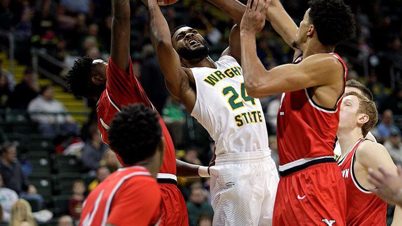 Wright State senior guard Mark Alstork draws a crown in the paint during the first half of Saturday’s 80-75 loss to Youngstown State. CONTRIBUTED BY TIM ZECHAR