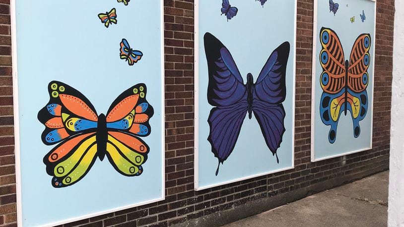 Miamisburg Art Gallery, which is incorporated as a non-profit organization. made colorful changes and additions to its exterior, adding a two-story tall sign on the north side of its building at 16 N. Main St. and mounting three artworks depicting butterflies on its south side. CONTRIBUTED