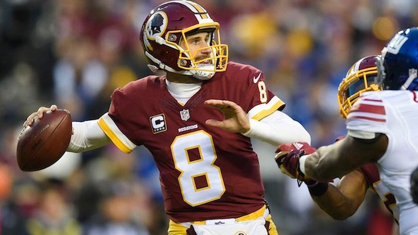 Washington Redskins quarterback Kirk Cousins (8) passes the ball during the first half of an NFL football game against the New York Giants in Landover, Md., Sunday, Jan. 1, 2017. (AP Photo/Nick Wass)