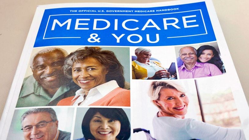 FILE - In this Nov. 8, 2018 file photo, the U.S. Medicare Handbook is photographed in Washington. (AP Photo/Pablo Martinez Monsivais)