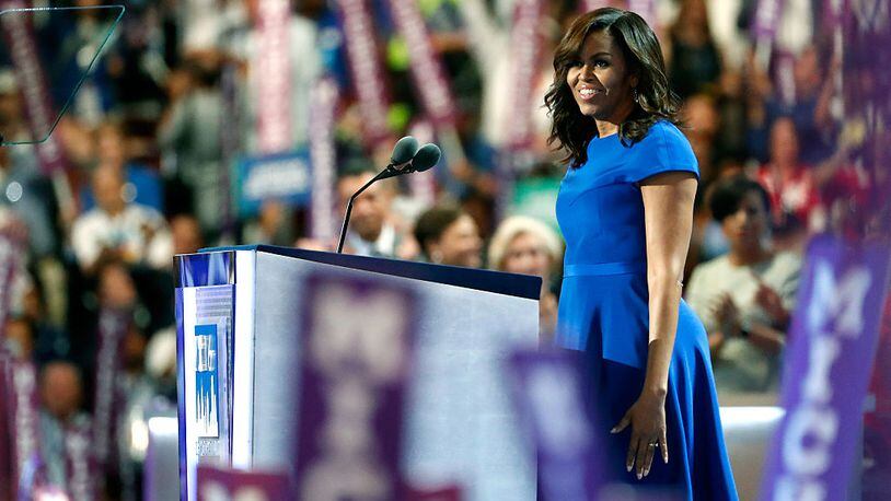 PHILADELPHIA, PA - JULY 25: First lady Michelle Obama walks on stage to deliver remarks on the first day of the Democratic National Convention at the Wells Fargo Center, July 25, 2016 in Philadelphia, Pennsylvania. An estimated 50,000 people are expected in Philadelphia, including hundreds of protesters and members of the media. The four-day Democratic National Convention kicked off July 25. (Photo by Aaron P. Bernstein/Getty Images)