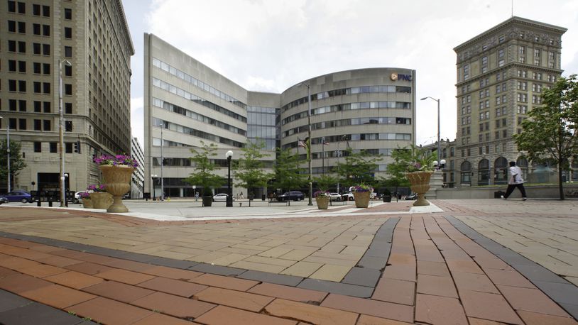 The Dayton Area Chamber of Commerce will move to the former PNC Building (center) at Third and Main streets. CHRIS STEWART / STAFF