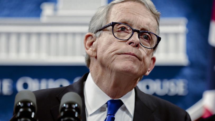 FILE - In this file photo from Aug. 6, 2019, Ohio Gov. Mike DeWine pauses while speaking at the Ohio Statehouse in Columbus, Ohio. DeWine is ready to unveil his upcoming state budget Monday, Feb. 1, 2021, with proposals to fund everything from schools, public colleges and universities, health care for poor children and families, and prison operations. This is the Republican governor's second budget proposal but the first to reflect revenue downturns caused by the coronavirus pandemic. (Joshua A. Bickel/The Columbus Dispatch via AP, File)
