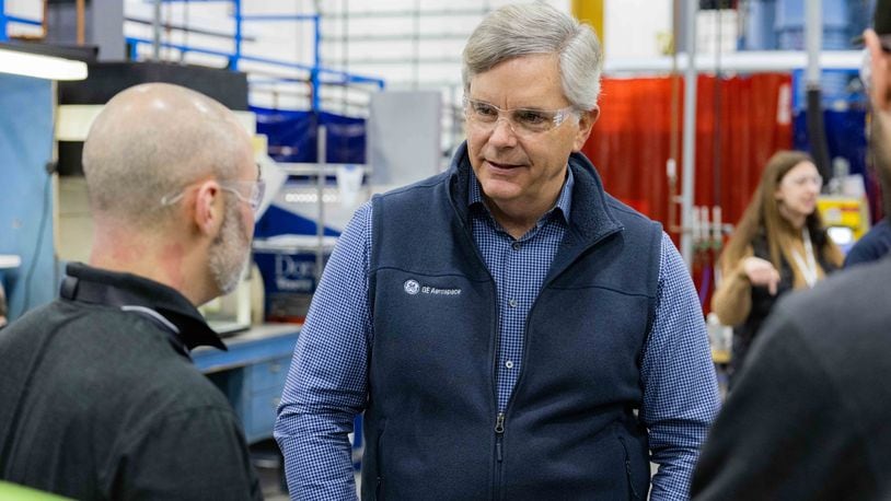Larry Culp, chairman and CEO of GE Aerospace, with an unnamed employee at the company's Beavercreek plant. GE Aerospace photo.