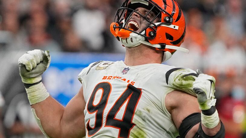 Cincinnati Bengals defensive end Sam Hubbard (94) reacts after making a tackle against the Las Vegas Raiders during the second half of an NFL football game, Sunday, Nov. 21, 2021, in Las Vegas. (AP Photo/Rick Scuteri)