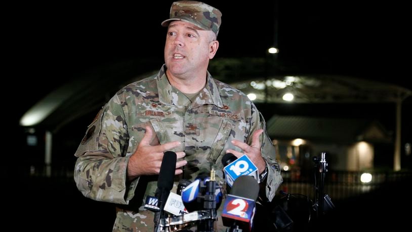 Col. Patrick MIller, 88th Air Base Wing and Installation Commander, answers questions during a Friday, Sept. 10, 2021, news conference after a lockdown at Wright-Patterson Air Force Base. The base was put on lockdown due to a report of a possible active shooter but was later given the all clear after no threat was found. (AP Photo/Jay LaPrete)