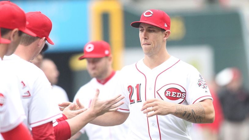 Reds reliever Michael Lorenzen is introduced before a game against the Nationals on Opening Day on Friday, March 30, 2018, at Great American Ball Park in Cincinnati. David Jablonski/Staff