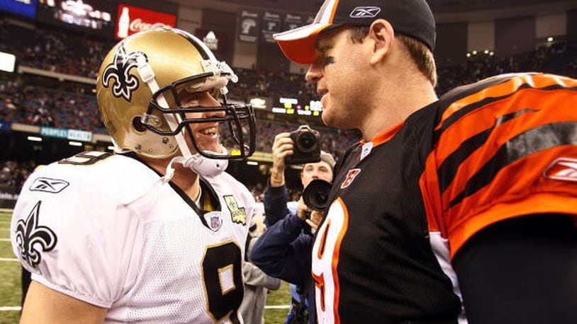NEW ORLEANS - NOVEMBER 19: Quarterback Drew Brees #9 of The New Orleans Saints talks with Carson Palmer #9 of the Cincinnati Bengals at the Superdome November 19, 2006 in New Orleans, Louisiana. The Bengals defeated the Saints 31-16. (Photo by Chris Graythen/Getty Images)