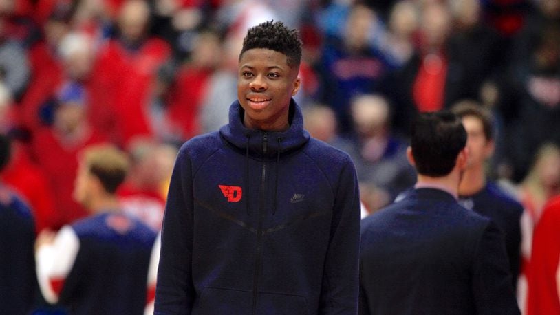 Kostas Antetokounmpo watches Dayton warm up before a game against Saint Mary’s at UD Arena in November. David Jablonski/Staff
