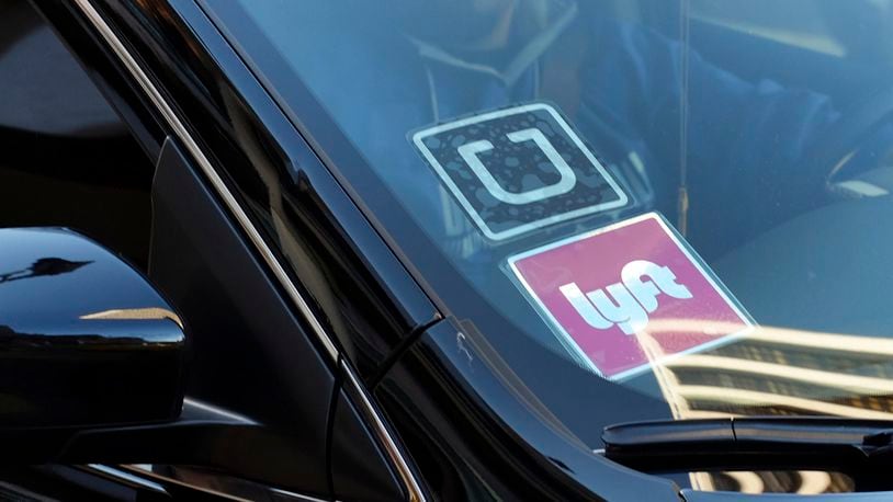 The safety of ride sharing services is being called into question. (AP Photo/Richard Vogel, File)