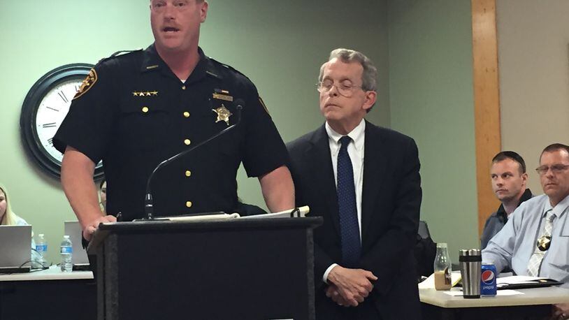 Pike County Sheriff Charles Reader and Ohio Attorney General Mike DeWine at an afternoon news conference to discuss the 2016 slayings of 8 people in Pike County. BOB GARLOCK/STAFF