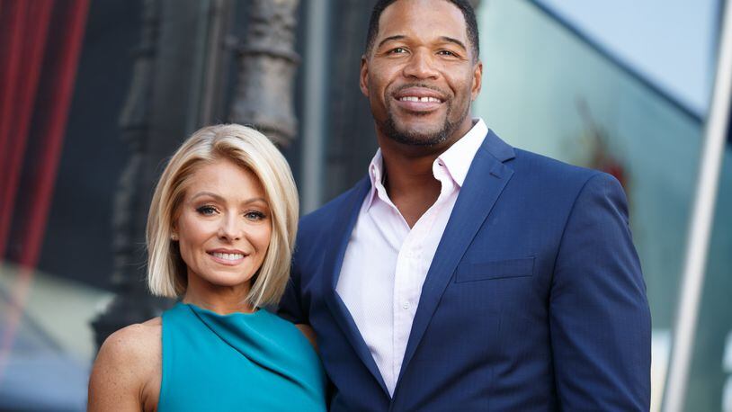 HOLLYWOOD, CA - OCTOBER 12: Television host Kelly Ripa (L) and Michael Strahan attend the Hollywood Walk of Fame on October 12, 2015 in Hollywood, California. (Photo by Mark Davis/Getty Images)