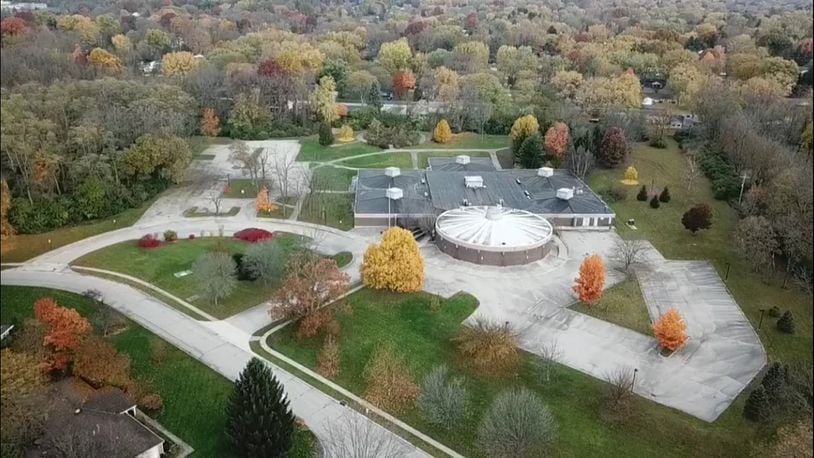 The long-debated future of the former Hithergreen Center in Washington Twp. hinges on the Centerville-Washington Park District’s ability to secure grant funding to demolish the building and turn the property into a park, an answer residents should learn early next month. STAFF/CHUCK HAMLIN
