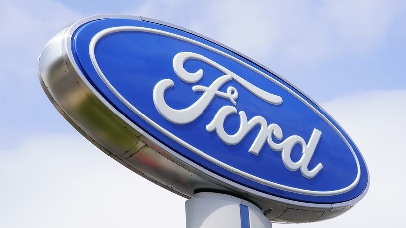FILE - A Ford sign is seen at a dealership in Springfield, Pa., April 26, 2022. The National Transportation Safety Board is investigating a March 3, 2024, crash near Philadelphia that killed two people and involved a Ford electric vehicle that may have been operating on a partially automated driving system. (AP Photo/Matt Rourke, File)
