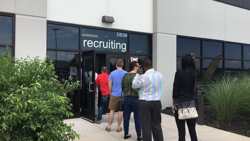 Job seekers stood in line to apply for open positions at the Amazon distribution center in Etna, Ohio. Etna is about 20 minutes west of Columbus, Ohio. KARA DRISCOLL/STAFF