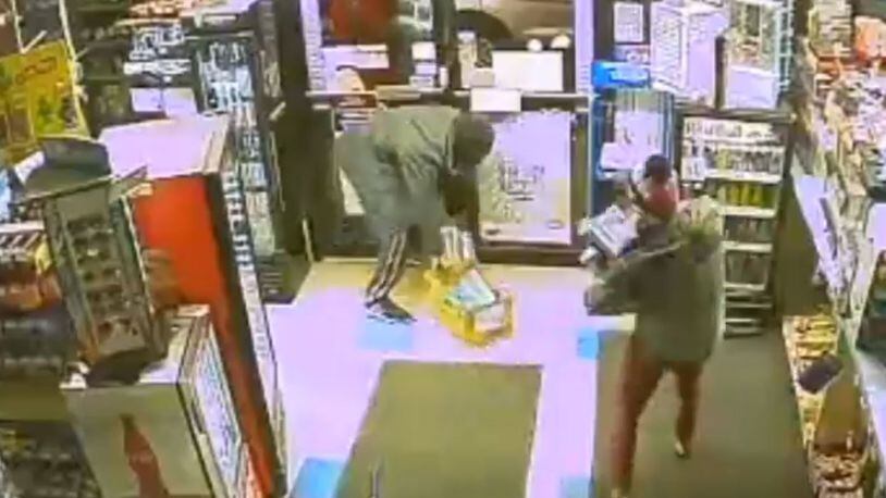 On Feb. 11, a couple steals cartons of cigarettes from convenience store in the city of Fairfield. CONTRIBUTED