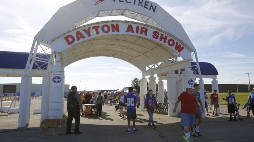 Airshow fans enter the gate early at the Vectren Dayton Air Show on a Saturday morning in 2017. TY GREENLEES / STAFF