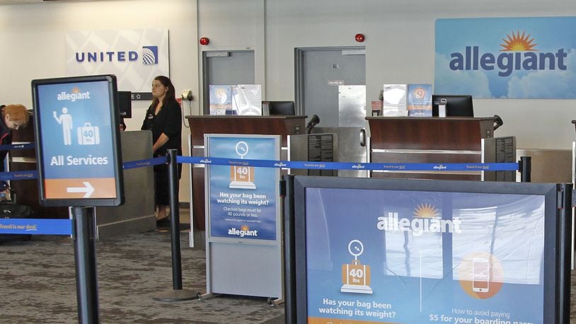 Check-in for Allegiant is closed on Tuesday, Wednesday and Saturday when the airline does not offer flights from Dayton. The loss of some additional Allegiant flights from Dayton is adding to the decline of passengers using the Dayton Airport over the past several years. TY GREENLEES / STAFF