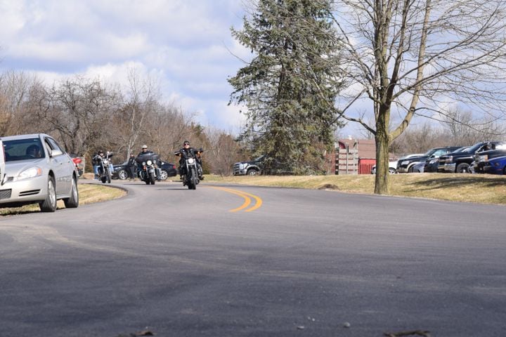 PHOTOS: Thousands of Outlaws attend motorcycle gang leaders funeral at Montgomery County Fairgrounds.