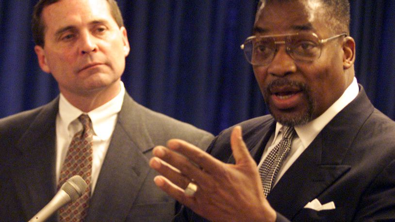 James Williams (right), superintendent of the Dayton Public Schools, speaks about an audit of the district by the office of state auditor Jim Petro in 1999. Dayton Daily News File Photo