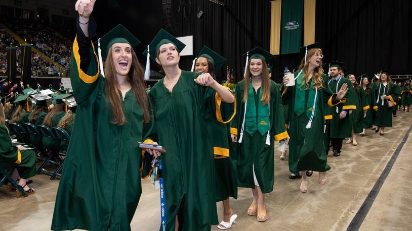 Wright State University graduated 1,603 students in April. Students received their diploma presentation folder during the ceremonies at the Nutter Center. CONTRIBUTED/WRIGHT STATE