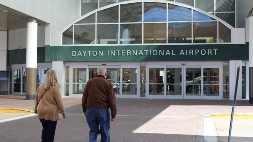 Travelers trickle into the Dayton International Airport in October 2016. CORNELIUS FROLIK / STAFF