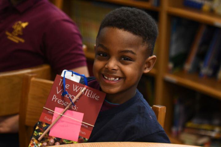 Photos: Dayton Strong! Kids receive copies of book they wrote about tornadoes