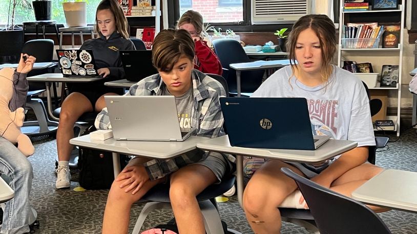 Students learn on laptops at Oakwood Junior High. CONTRIBUTED