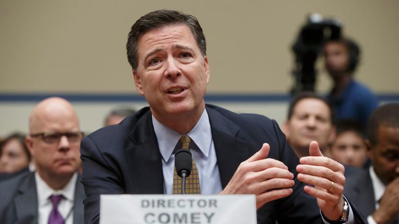 In this July 7, 2016, file photo, FBI Director James Comey testifies on Capitol Hill in Washington before the House Oversight Committee to explain his agency's recommendation to not prosecute Hillary Clinton. (AP Photo/J. Scott Applewhite, File)