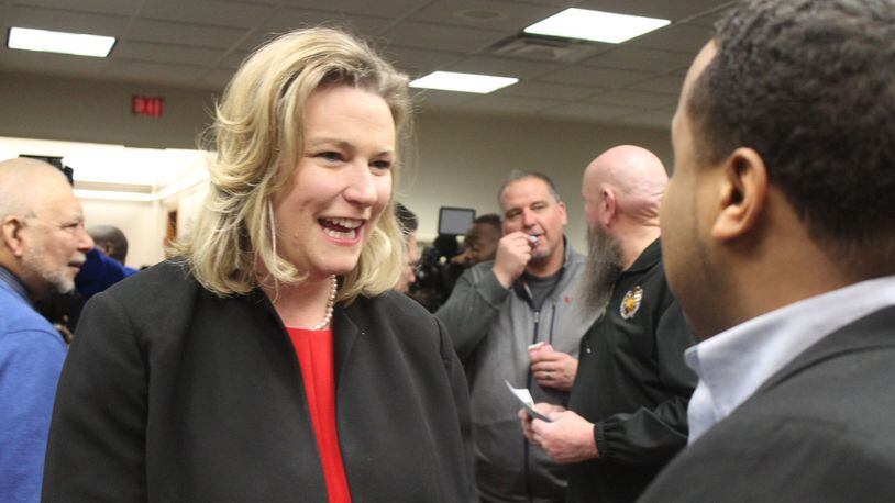 Dayton Mayor Nan Whaley talks to residents, city staff and supporters after her State of the City speech Feb. 14, 2018. CORY FROLIK/STAFF