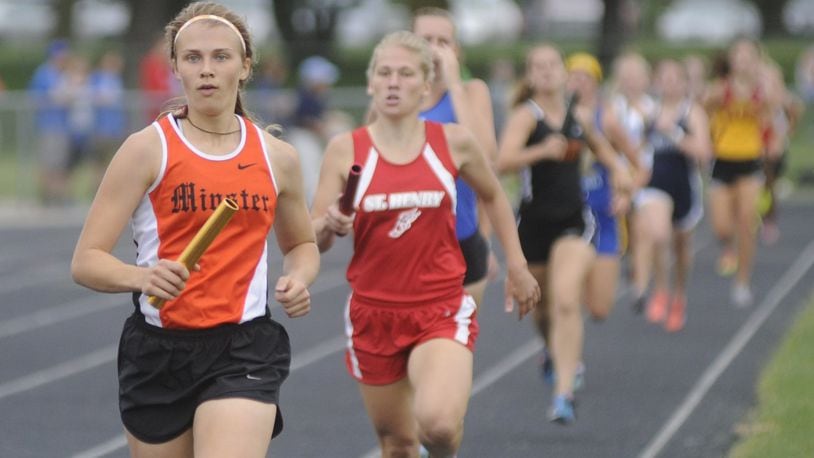 Minster’s Cassie Francis in the 4x800 relay during the D-III regional track and field meet at Troy’s Memorial Stadium on Wednesday, May 24, 2017. MARC PENDLETON / STAFF