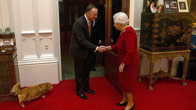 Queen Elizabeth's corgis were always near her, even when she greeted New Zealand Prime Minister John Key in 2015.