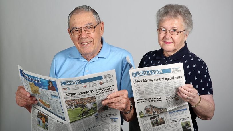 Long-time Dayton Daily News subscribers, Carol and George Walling. LISA POWELL / STAFF