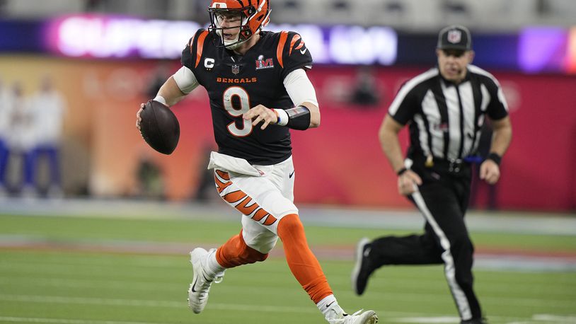 Cincinnati Bengals quarterback Joe Burrow (9) looks to pass against the Los Angeles Rams during the second half of the NFL Super Bowl 56 football game Sunday, Feb. 13, 2022, in Inglewood, Calif. (AP Photo/Lynne Sladky)