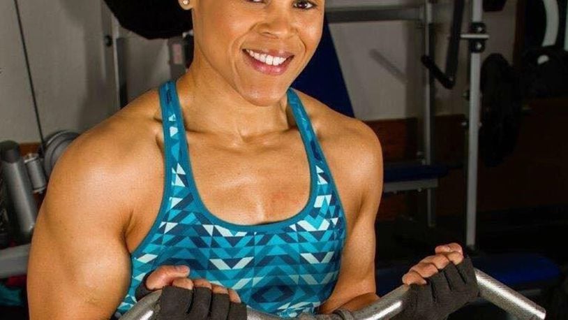 Danielle Burress, 88th Force Support Squadron Community Services flight chief and Air Force Reserve captain, poses in the gym where she trains for bodybuilding competitions Oct. 17. (Courtesy photos)