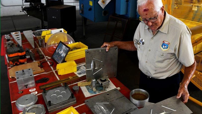 John Rumpf, a restoration volunteer at the National Museum of the United States Air Force, works to restore pieces of aircraft to be exhibited. (U.S. Air Force photo/Darrius A. Parker)