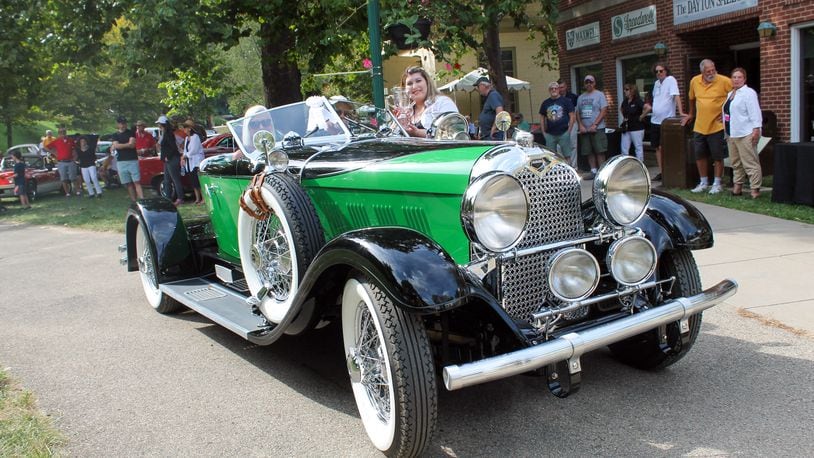Beavercreek's Richard and Helen Harding captured the Col. Edward Deeds Judge's Choice Award presented by Win Supply, Inc. with their stunning 1928 Auburn 8-115, shown here during the awards ceremony at the Dayton Concours d'Elegance.  Photo by  Haylie Schlater.