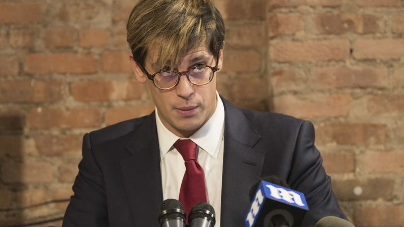 Milo Yiannopoulos speaks during a news conference, Tuesday, Feb. 21, 2017, in New York. Yiannopoulos has resigned as editor of Breitbart Tech after coming under fire from other conservatives over comments on sexual relationships between boys and older men. (AP Photo/Mary Altaffer)