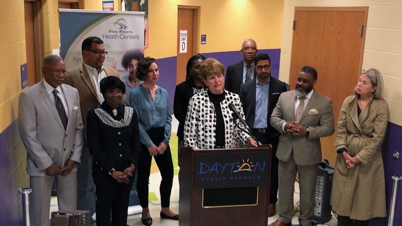 Representatives of Dayton Public Schools, Five Rivers Health Centers and the city of Dayton announce plans to open a student health center at an April media event. The center will be located in the newly named Roosevelt elementary school at 1923 W. Third St. JEREMY P. KELLEY / STAFF